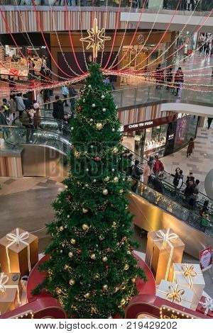 Wuhan Hubei China, 24 December 2017: Christmas tree and decorations inside Livat modern shopping mall in China on Christmas eve