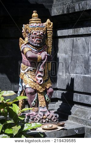 traditional ancient balinese hindu statues in bali temple indonesia
