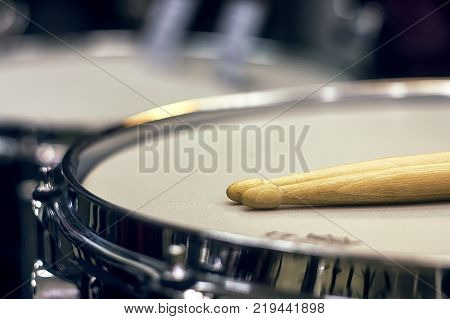 Detail Of A Drummer Dressed In Red Costume With Medieval Clothes. Wooden Chopsticks Are Held Firmly