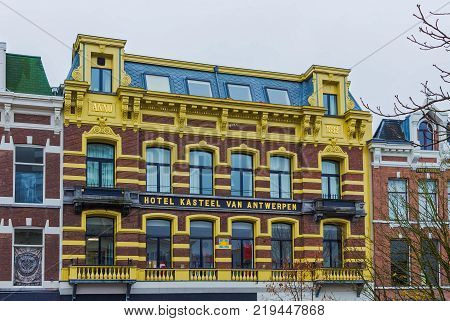 Utrecht, Netherlands - December 15, 2017: Street with hotel Kasteel Van Antwerpen at historic house in the center of Utrecht, Netherlands on December 15, 2017