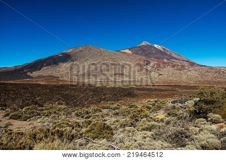 Teide National Park, Tenerife, Canary Islands - A picturesque view of the colourful Teide volcano, or in spanish 'Pico del Teide'. The tallest peak in Spain with an elevation of 3718 m.