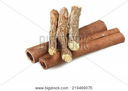 Cinnamon stick and Liqorice on the white