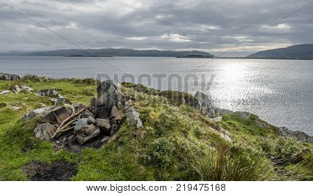 Craignish point at the rotten pier with fire place with the Sound of Jura in the background, Scotland