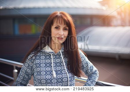 happy woman standing in a shopping mall. half-length portrait.