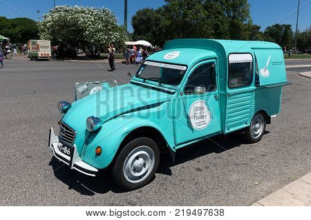 Lisbon Portugal August 6 2017: Citroen 2CV van converted to a food vendor's cart.