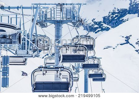 Cable car way in the mountain ski resort.