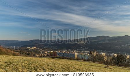 View for Dobetice village and part of town Usti nad Labem in winter sunny day