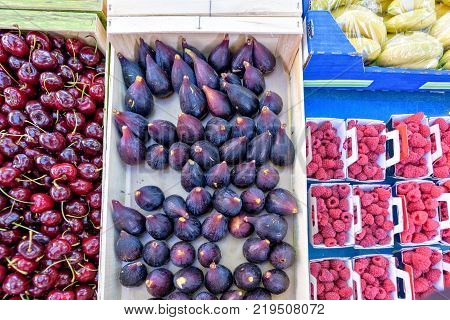 Fresh Red Cherries For Sale In Local Marketplace Texture