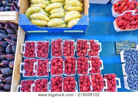 Fresh Red Cherries For Sale In Local Marketplace Texture