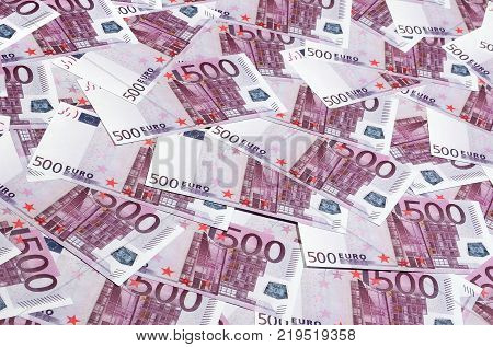 Money background consisting of purple five hundred Euro bills spread across the screen. Symbolic texture photo of wealth