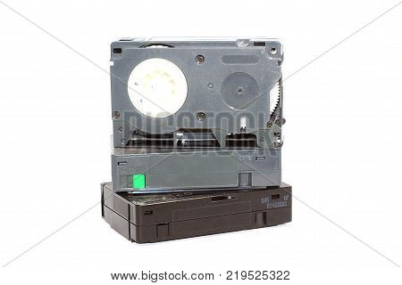 VHS-C small video cassettes isolated on white background.