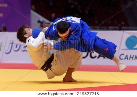 ST. PETERSBURG, RUSSIA - DECEMBER 16, 2017: Fight for 3rd place Tommy Macias, Sweden (white) vs Giyosjon Boboev, Uzbekistan during Judo World Masters tour. Macias won bronze medal