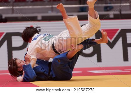 ST. PETERSBURG, RUSSIA - DECEMBER 16, 2017: Final fight Miku Tashiro (white) vs Nami Nabekura, both of Japan during Judo World Masters tour. Tashiro won gold medal