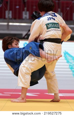 ST. PETERSBURG, RUSSIA - DECEMBER 16, 2017: Final fight Miku Tashiro (white) vs Nami Nabekura, both of Japan during Judo World Masters tour. Tashiro won gold medal