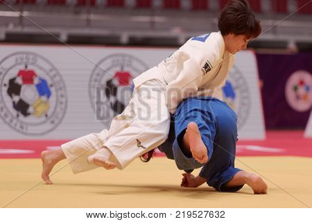 ST. PETERSBURG, RUSSIA - DECEMBER 16, 2017: Final fight Miku Tashiro (white) vs Nami Nabekura, both of Japan during Judo World Masters tour. Tashiro won gold medal