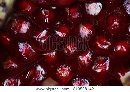 Macro view of ripe seeds of pomegranate.