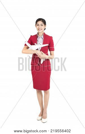 Portrait Of Asian Air Hostess Holding Airplane Model And Passport With White Background Woman Stand 