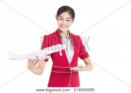 Portrait Of Asian Air Hostess Holding Airplane Model And Passport, Woman Stand And Smile, Woman With