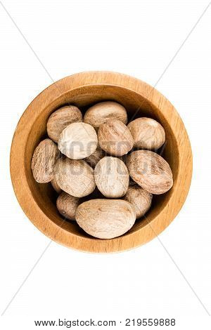 Pile Of Whole Dried Nutmeg Seed For Flavoring