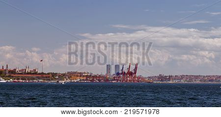 Container Cargo Cranes Loading And Unloading Of Containers In The Sea Port, Logistic Import Export T