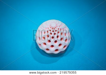 Abstract object of a blue color printed by 3d printer on white background. Fused deposition modeling, FDM. Progressive modern additive technology. Concept of 4.0 industrial revolution