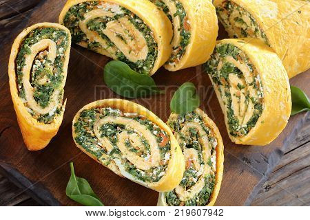 Egg And Cheese Roulade With Spinach And Feta