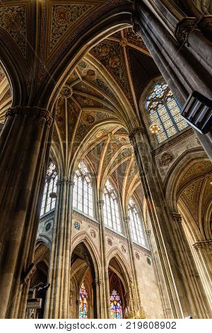 Vienna, Austria - August 16, 2017: Votivkirche, Votive Church in Vienna, interior view. The church was dedicated in 1879 on the silver anniversary of Emperor Franz Joseph and his wife Elisabeth