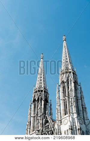 Vienna,  Austria - August 16, 2017: Votivkirche, Votive Church in Vienna, outdoor view of the towers