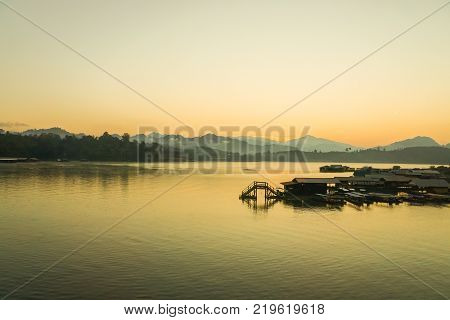 landscape of floating residence in sunrise in Sangklaburi Kanchaburi Thailand