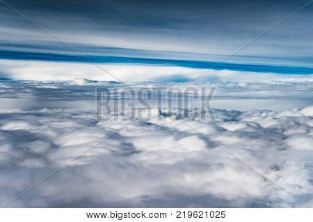 Top view of Thailand through clouds from the plane.