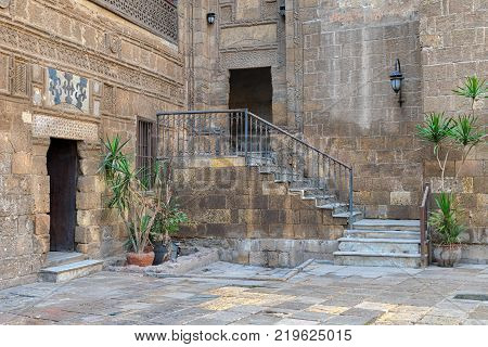 Cairo, Egypt - November 25, 2017: Courtyard of Prince Taz palace with staircase and entrance leading to the first floor located in Old Cairo Egypt