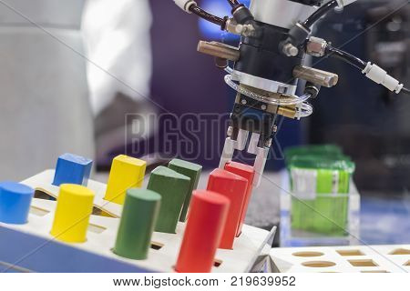 Robotic arm pick and place automation;process of picking parts up and placing them in new location