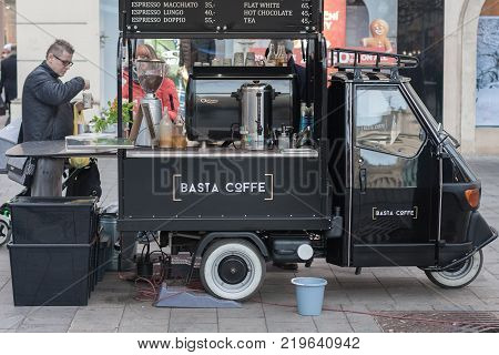 Brno,Czech Republic-December 18,2017: Man is buying a drink at a mobile drink van at Christmas market at Liberty Square on December 18, 2017 Brno Czech Republic