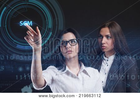 The Concept Of Business, Technology, The Internet And The Network. A Team Of Business Women Working