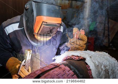 Welder In The Shop Weld Sample From The Tube With Concomitant Heating For Attestation