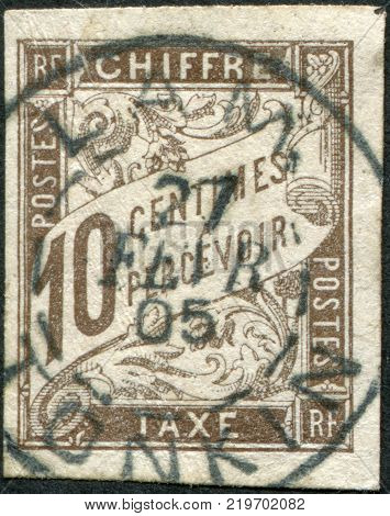 FRANCE - CIRCA 1883: A stamp printed in France (for use in the colonies) shows a face value of port marks circa 1883