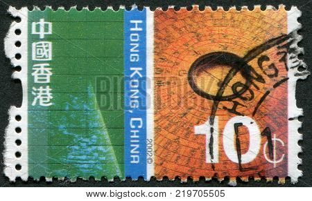 HONG KONG - CIRCA 2002: A stamp printed in the Hong Kong shows the Radar screen and luopan circa 2002
