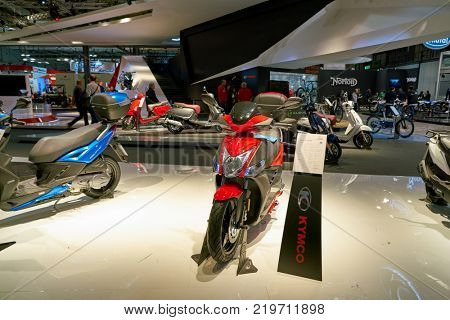 MILAN, ITALY - NOVEMBER 11, 2017: scooters on display at EICMA 2017 - 75th International Motorcycle Exhibition.
