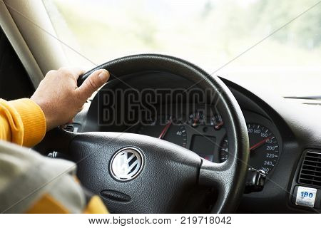German old man driving car very fast on highway of Stuttgart go to Sandhausen district on September 3 2017 in Stuttgart Germany.