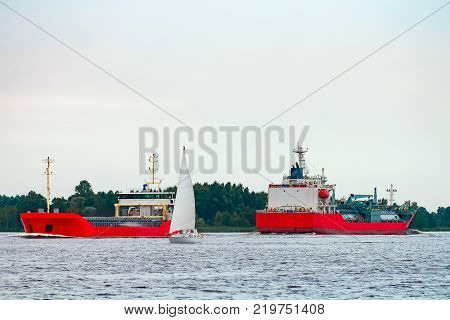 Red Cargo Ship At Riga