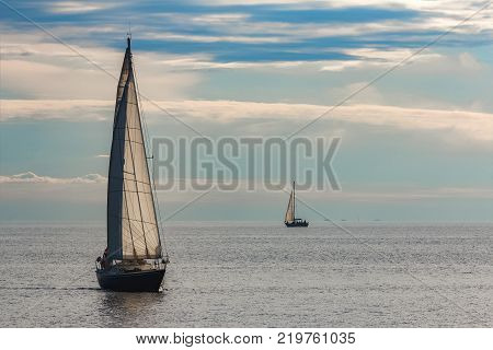 Sailboats Traveling By Baltic Sea