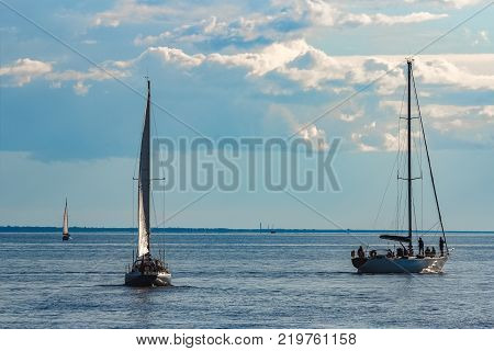 Sailboats Traveling By Baltic Sea
