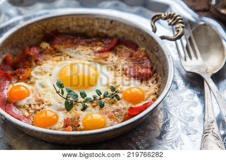 Pastirmali yumurta - traditional turkish dish with eggs and cured beef.