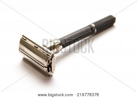 Traditional double edge safety razor isolated on white background