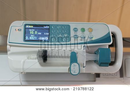 A syringe driver or syringe pump is a small infusion pump