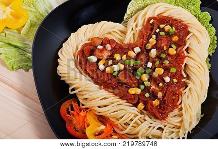 Pasta with vegetable sauce and turkey meat diet menu. Valentine's Day.