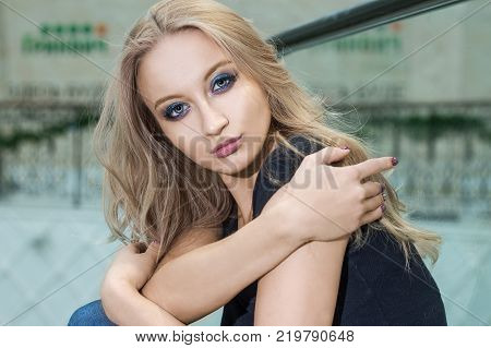 Shot of beautiful young woman looking at the lens