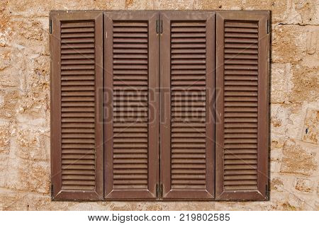 Brown Wooden Window On Yellow Castle Old Stone Pattern Texture Wall Close