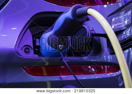 The Electric Vehecle ( EV ) charger ; selective focus