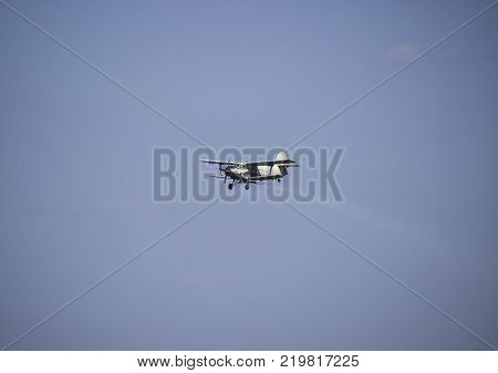 Aircraft agricultural aviation AN-2. The spraying of fertilizers and pesticides on the field with the aircraft.